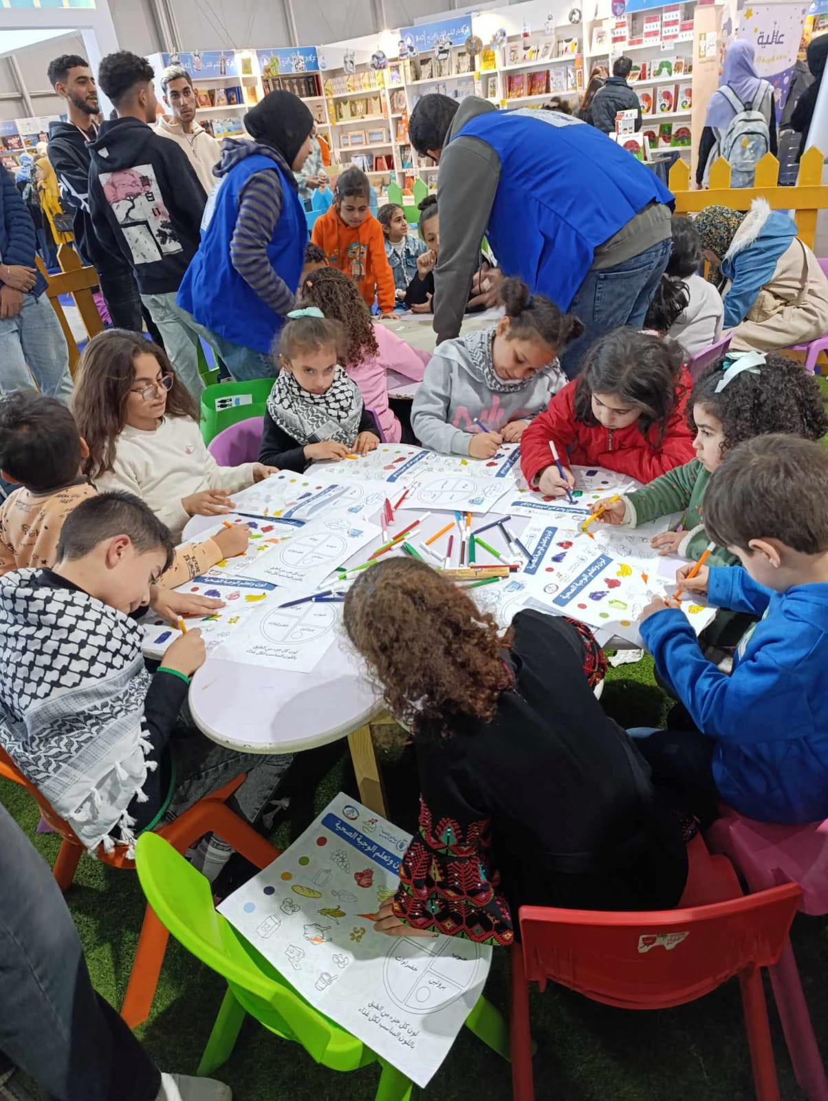 65 من أطفال غزة في زيارة لمعرض الكتاب